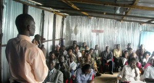Pastor Emmanuel preaching at the Life in Christ Church in Kibera in 2009