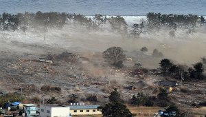 The wall of water flooding into Japan on March 11, 2011 (Newscom/Kyodo/WENN.com)