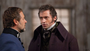 Javert explains his mistaken suspicion to the mayor (Valjean)