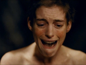 Fantine weeps in despair of her dissolute life.